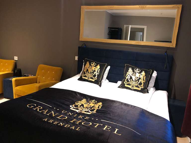 Bed with Blue Headboard